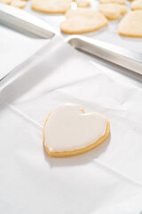 Heart-shaped sugar cookies with royal icing
