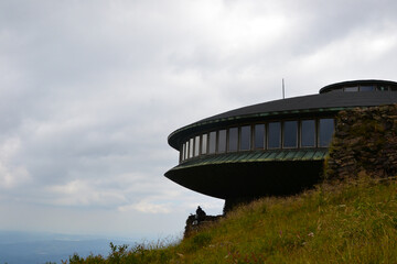 Sniezka, Poland and Czech Republic border. The Polish meteo observatory on the Sniezka mountain top.  A disc-shaped observatory with a weather station. Karkonosze Mountains, Poland