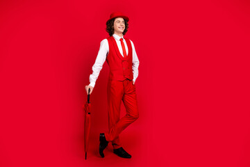 Full body size photo of classy teenager guy prepared for willy wonka movie announcement in cinema isolated on red color background