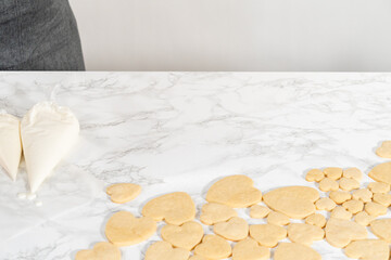 Heart-shaped sugar cookies with royal icing