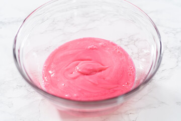 Homemade royal icing for decorating heart-shaped sugar cookies