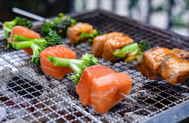 Chicken grilled shish kebab. Homemade healthy meal, salmon with vegetables serving food for restaurant, menu, advert or package, close up, selective focus