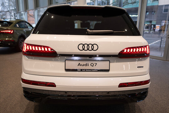 hybrid SUV Car Audi e-tron Q7 quattro, taillights, white multi-drive vehicle in showroom rear view, Sustainable Mobility, Technology automotive industry show in Frankfurt, Germany - January 22, 2024