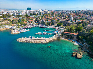 Fototapeta na wymiar The bay in the city of Antalya from a height on a sunny day in Turkey. Photo from the drone