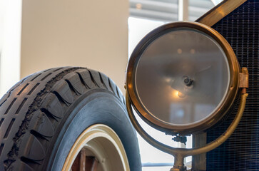 retro car wheel and headlight