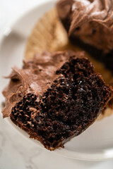 Chocolate Cupcake Sliced in Half on Kitchen Counter