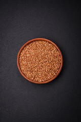 Large grains of raw buckwheat porridge are brown in color