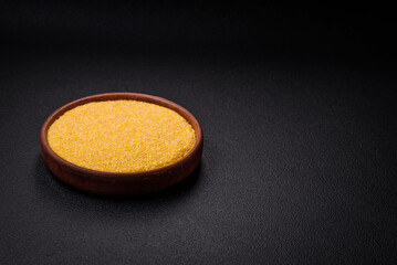 Corn grains or particles are yellow in color when raw