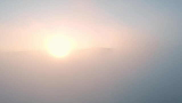 The sun rising from the mountains