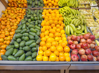 choosing fruit at the grocery store