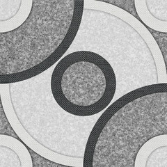 Circular pattern with gray and black andesite stone base combined with sand texture