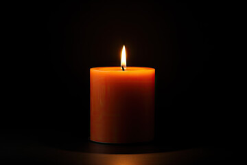 Fototapeta na wymiar Burning candle on black background, closeup