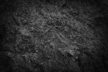Dark black stone background or texture.