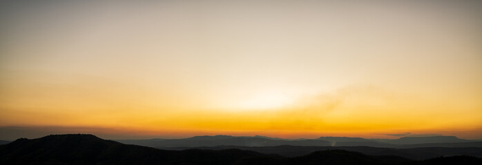 Fototapeta na wymiar Panoramic beautiful sunset sky with clouds.