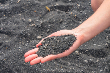 handful of black sand