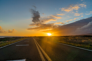 sunset on the road on the coast of the pacific on big island in hawaii