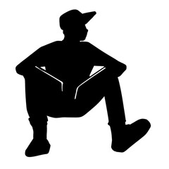 silhouette of a person with hat sitting