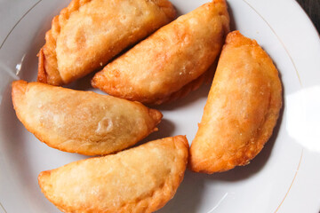 Fried empanadas on a plate