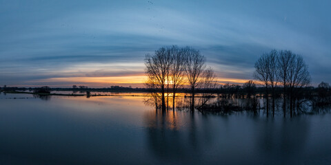 Fototapeta na wymiar sunset over flood plains
