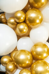 Golden festive background with balloons