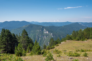 Fototapeta na wymiar Summer landscape of the Rhodope Mountains above the village of Gyovren, Bulgaria.
