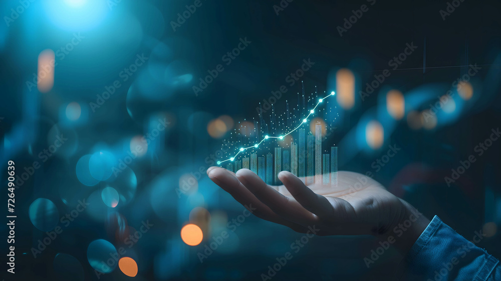 Wall mural hand holding digital histogram show financial and business growth