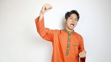Asian Muslim man excited expression