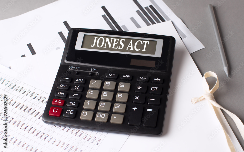 Aufkleber jones act text on calculator with chart on grey background