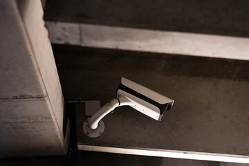 surveillance cam in urban parking house providing safty and security for parked cars and owners
