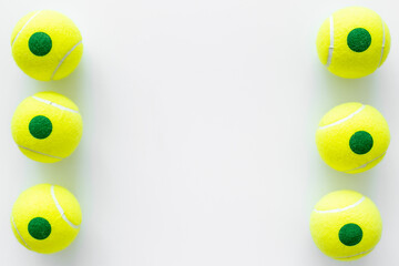 Set of green tennis balls, top view. Sport games background