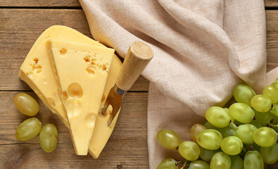 traditional maasdam cheese on a wooden board