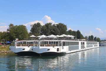 Cruise liner docked at the banks of river Rhine (Breisach, Upper Rhine Valley, Germany)
