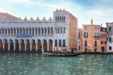 Venice, Italy with canals, gondolas, bridges, palazzo at Grand Canal