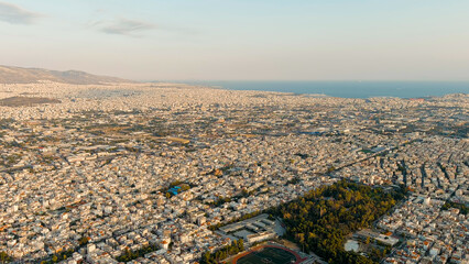 Athens, Greece. Panorama of the capital during sunset. Roofs of houses, Aerial View