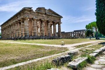 Fototapeta na wymiar The Temple of Hera II (called the Temple of Neptune or of Poseidon), is a Greek temple in Paestum, Campania, Italy. It was built in 460–450 BC