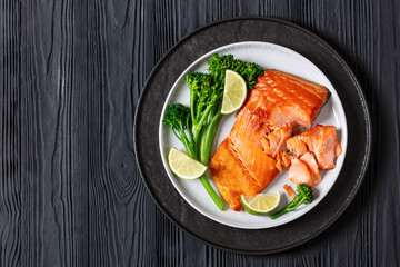hot smoked salmon with cooked broccoli and lime
