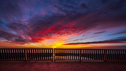 sunrise over the playa as seen from the bridge by the laguna - obrazy, fototapety, plakaty