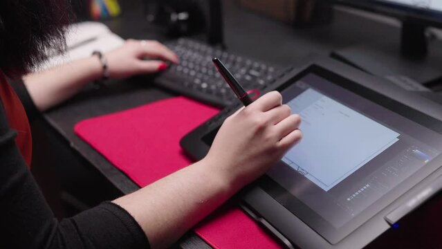 Female illustrator draws. Woman works coding. Digital designer look tablet pad. Girl hold pen. Freelance artist use hand drawing app. Develop job skill. 
