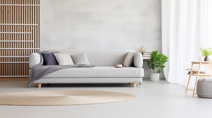 Minimalist Luxury - A Comfortable Gray Sofa with Designer Cushions, Set in a Bright, Open Flat