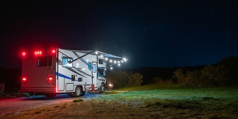 Modern Class C Motorhome Camping Under Starry Sky