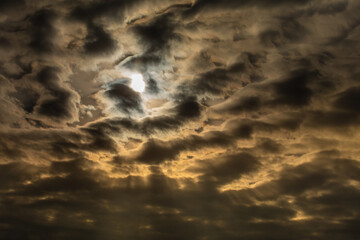 Moon among the clouds in Bistrita, Romania 2023