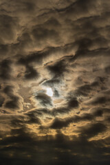 Moon among the clouds in Bistrita, Romania 2023
