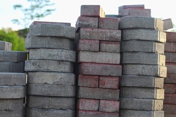 Pile of paving block stones in a rural environment