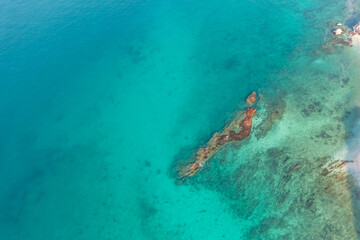 Aerial view reefs in the waters of a tropical lagoon.