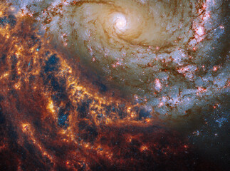 Face-on spiral galaxy, NGC 4303. Pink, orange and red galactic long-range captured imagery....