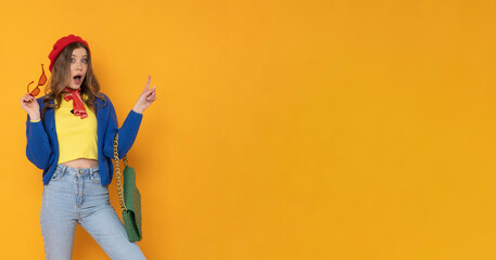 Excited woman in colorful outfit.