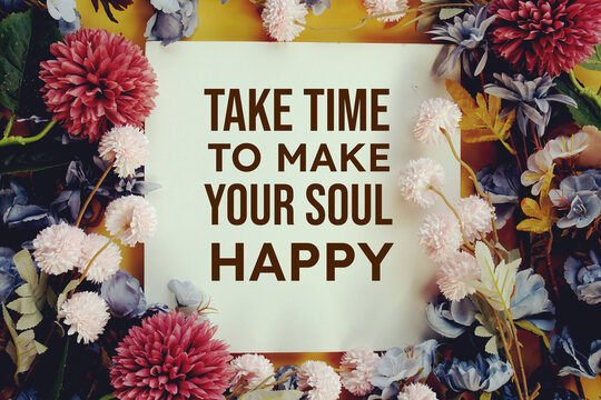 "Take time to Make Your Soul Happy" Inspirational quotes text message with flower decoration on yellow background