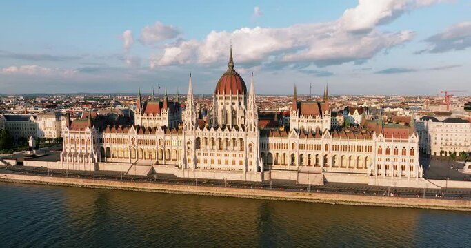 Aerial view Residence of Hungarian Parliament, Budapest national building symbol view from opposite bank of Danube River backdrop of sunset on sunny day in summer. Travel destination. Tourism