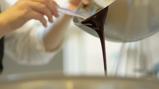 Professional Confectioner Making Chocolate Cake