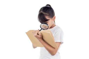Asian girl reading the books with a magnifying glass isolated on white background with clipping path.